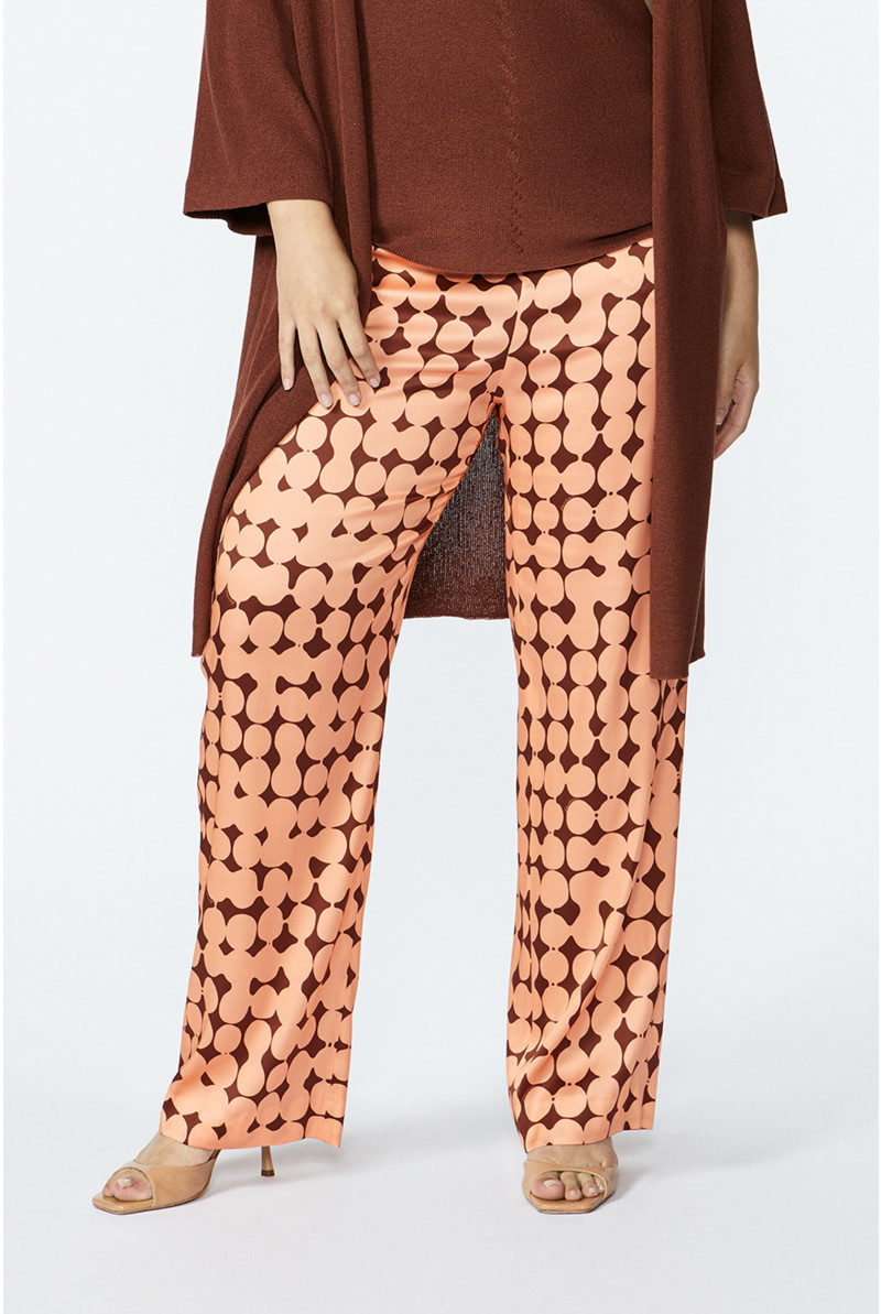 Trousers with in-house dot print