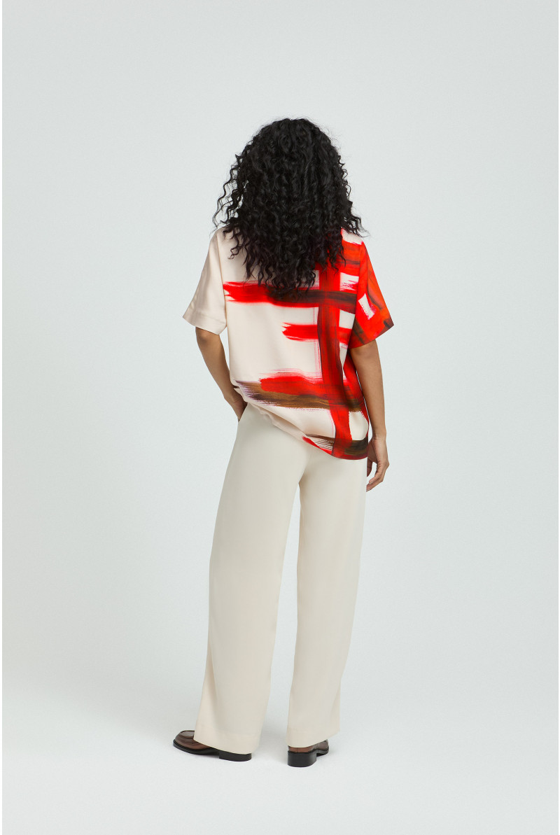 Blouse met asymmetrische print