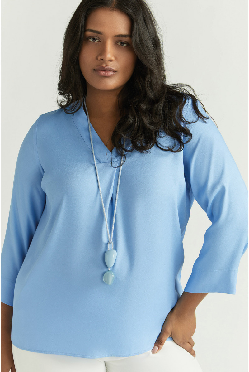 Soepelvallende blouse met V-hals