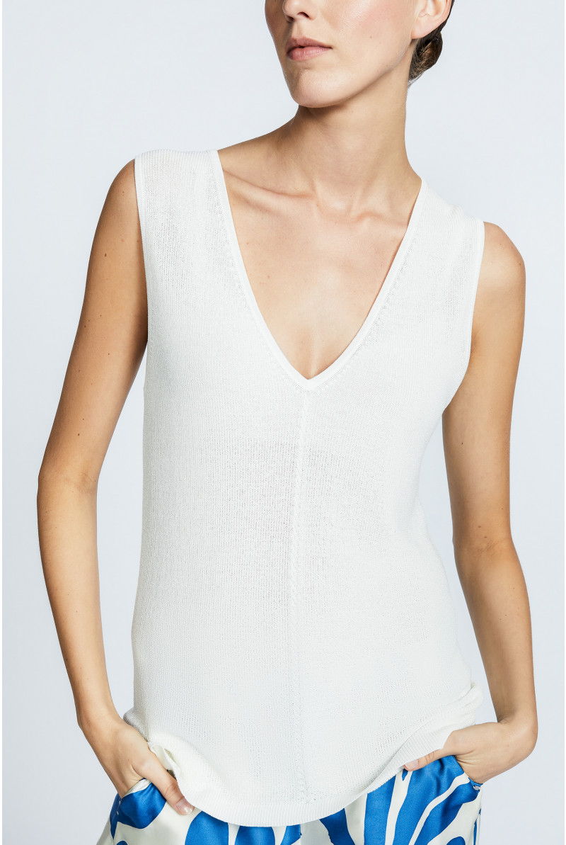 Mouwloze pull met parelsteek