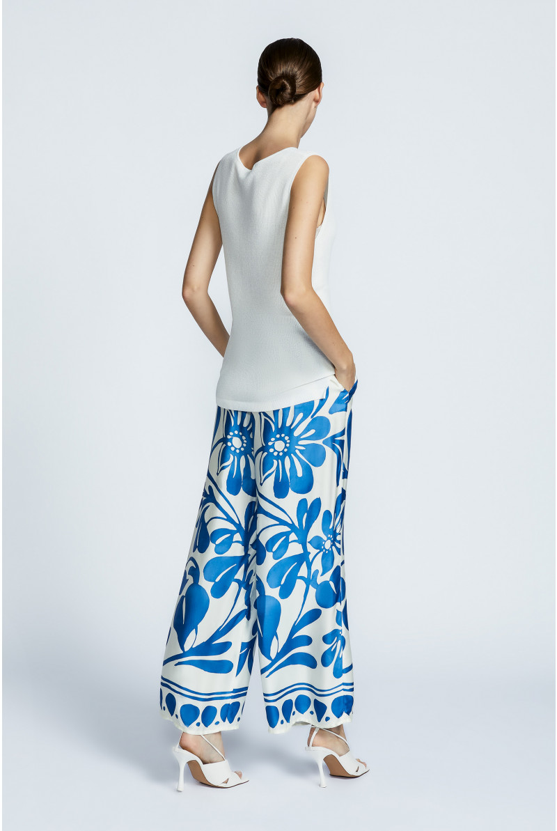 Mouwloze pull met parelsteek