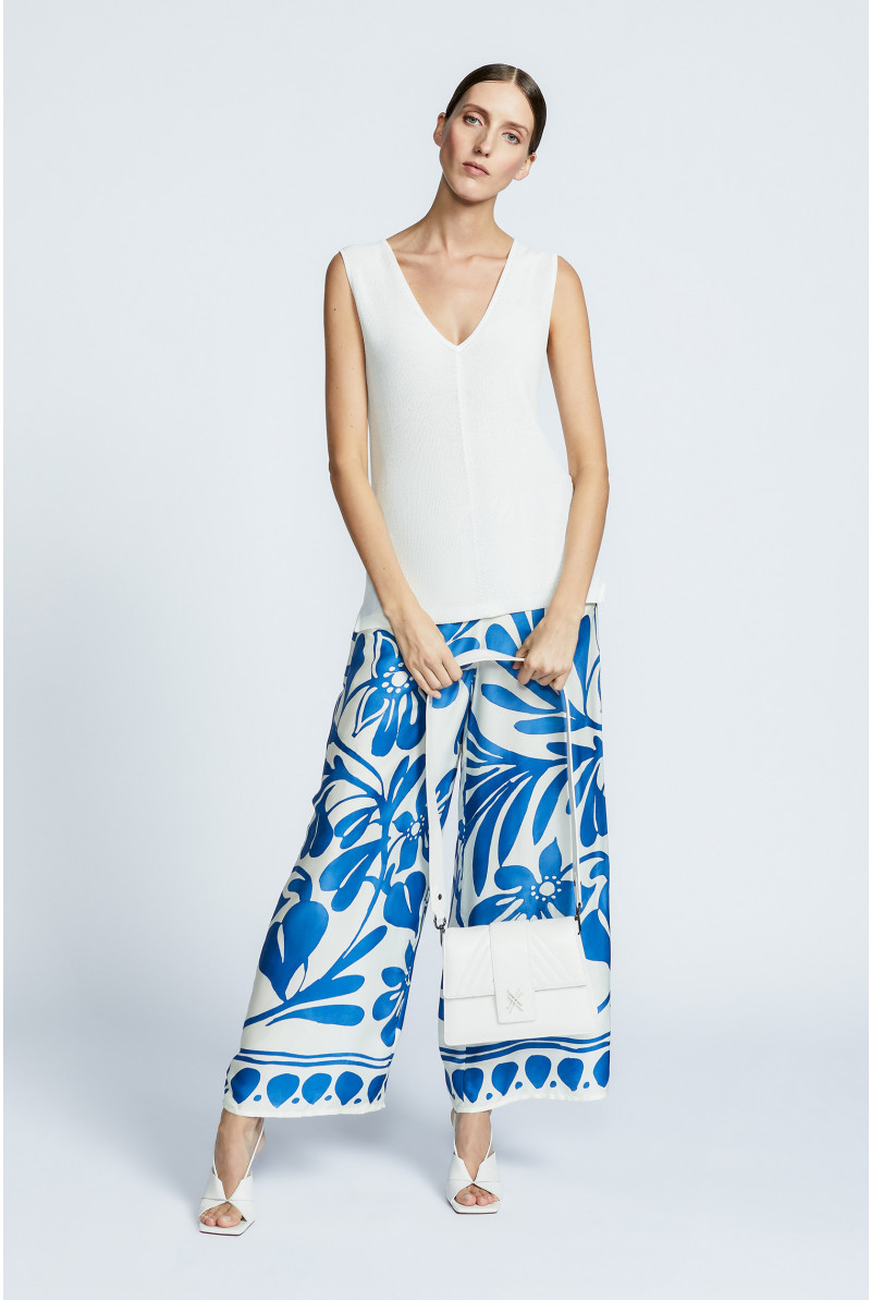 Mouwloze pull met parelsteek