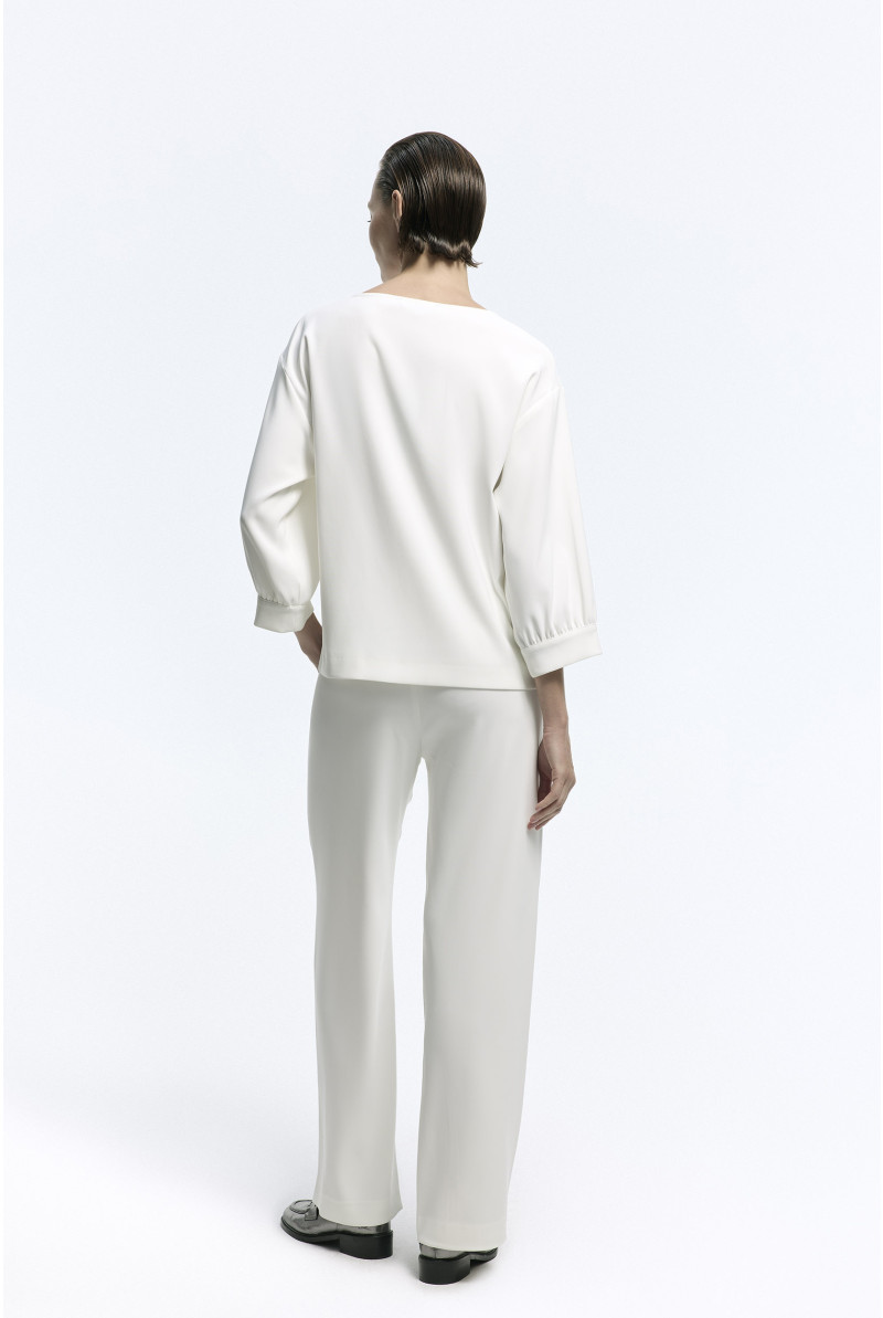 White loose-fitting trousers
