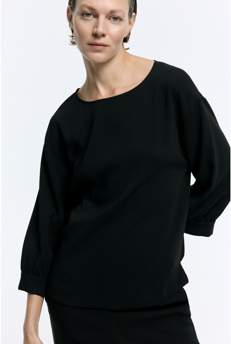 Bluse mit weiten Ärmeln