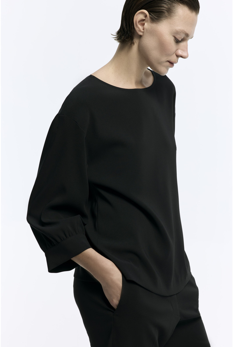 Blouse with loose sleeves