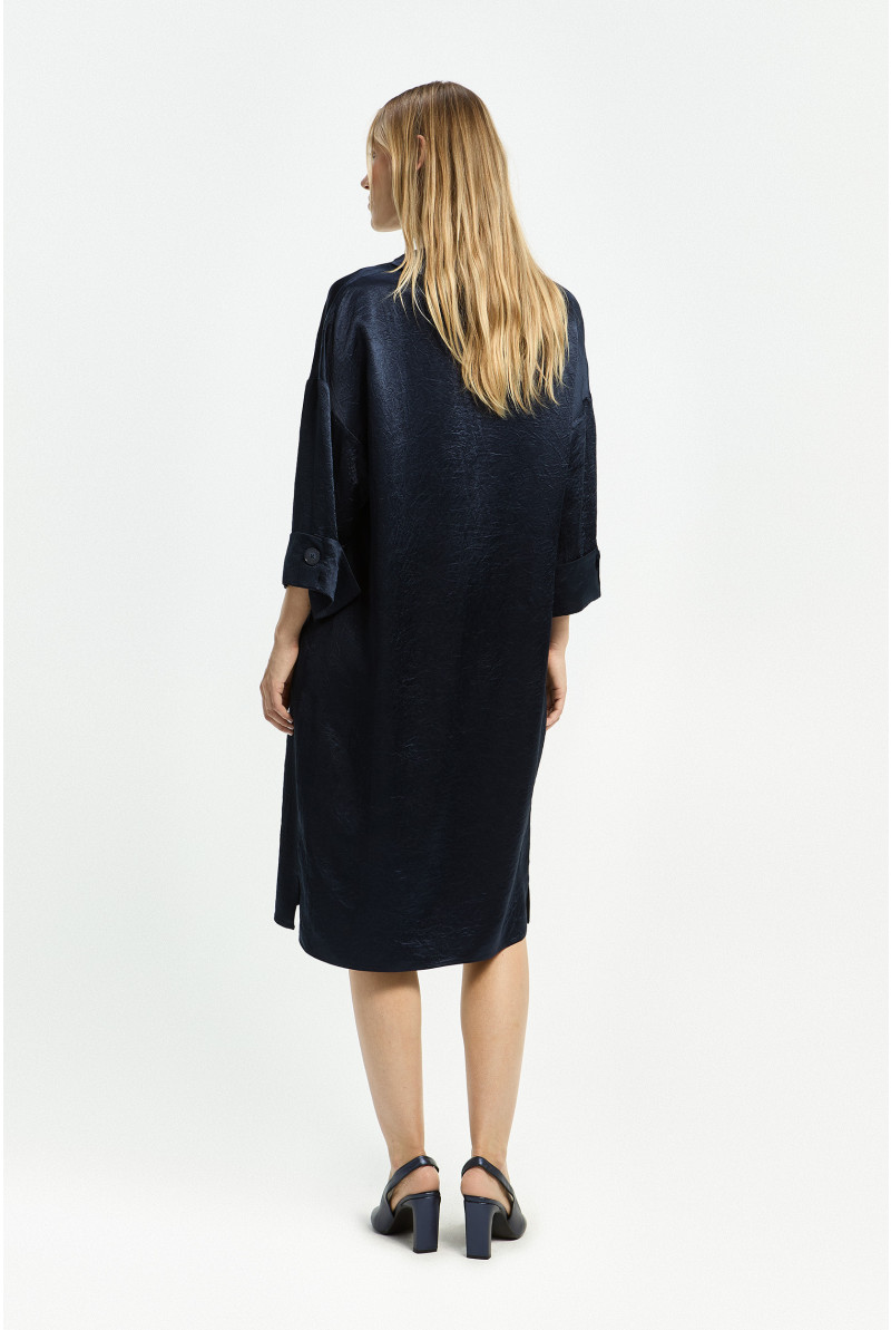 Robe polo à plis raffinés