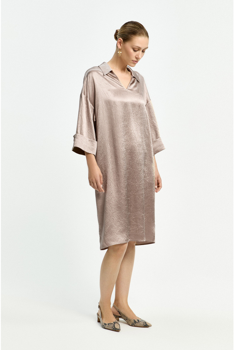 Polo dress with sophisticated pleats