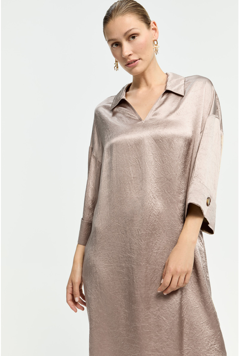 Polo dress with sophisticated pleats