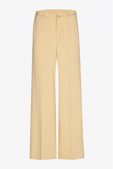 Wide trousers with a pressed crease