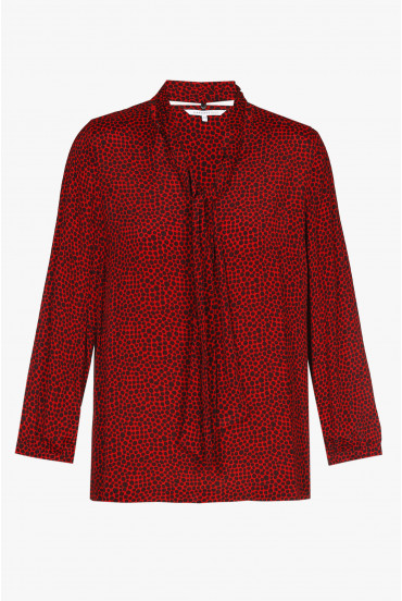 Red blouse with brown polka dot print