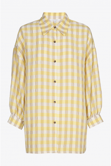 Longue blouse à carreaux dans des tons blanc, jaune et brun clair