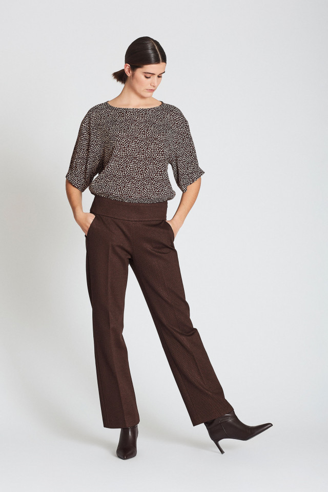 Brown trousers with chevron pattern