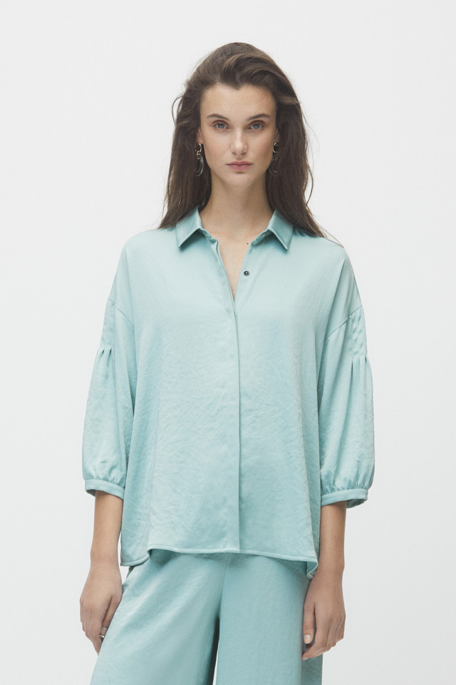 Light green blouse with puff sleeves