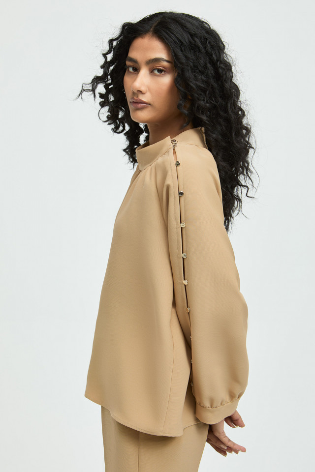 Blouse met knoopdetail aan mouw