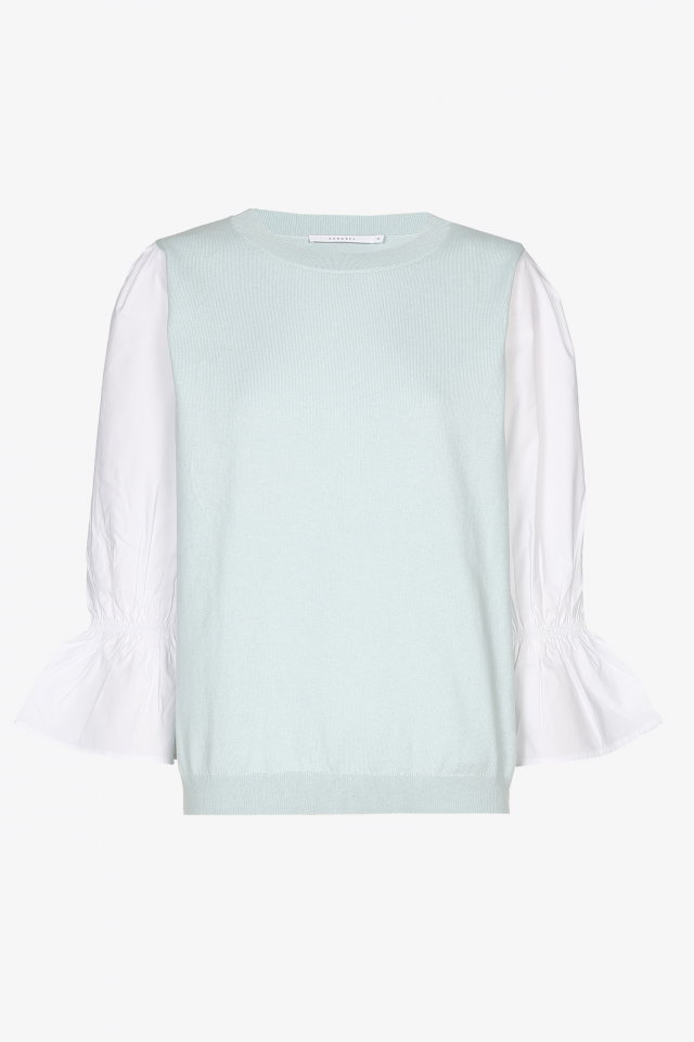 Mint green pullover with white blouse sleeves