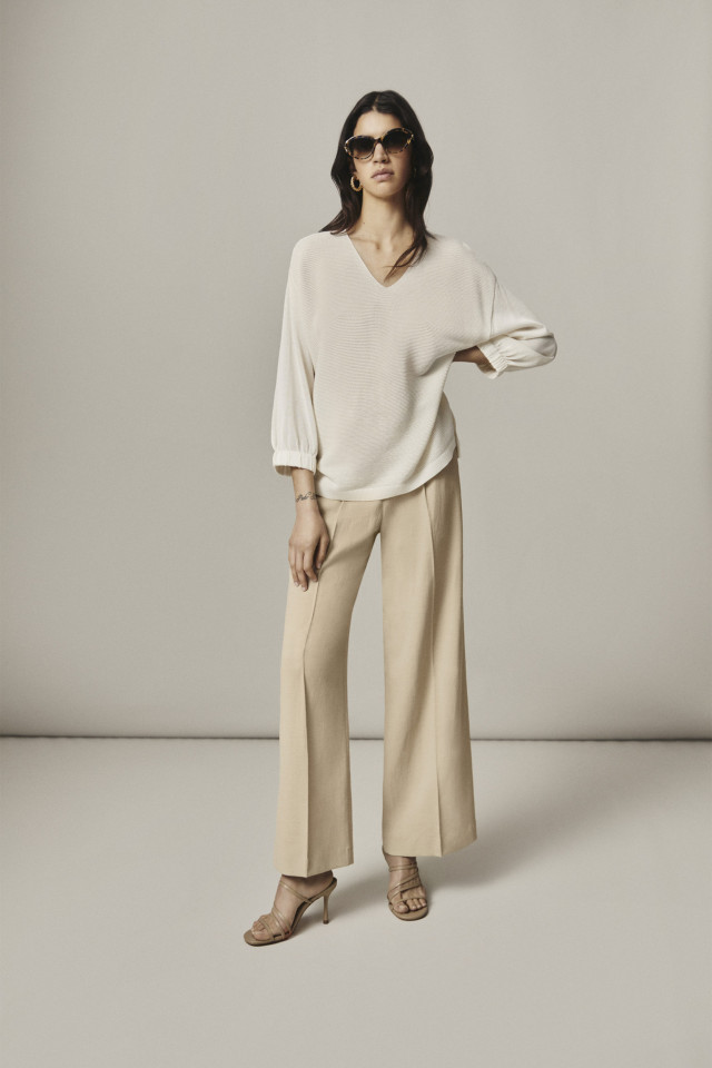 Witte pull met pofmouwen