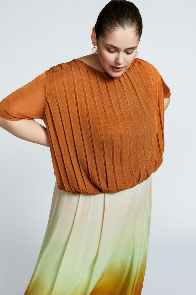 Pull à manches transparentes