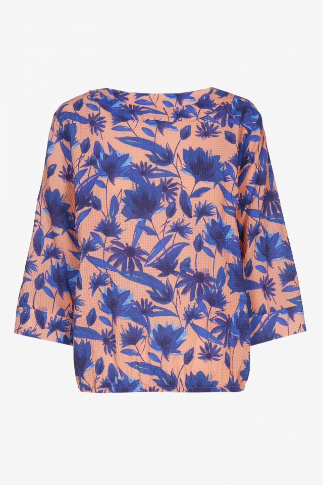 Orange blouse with blue floral print