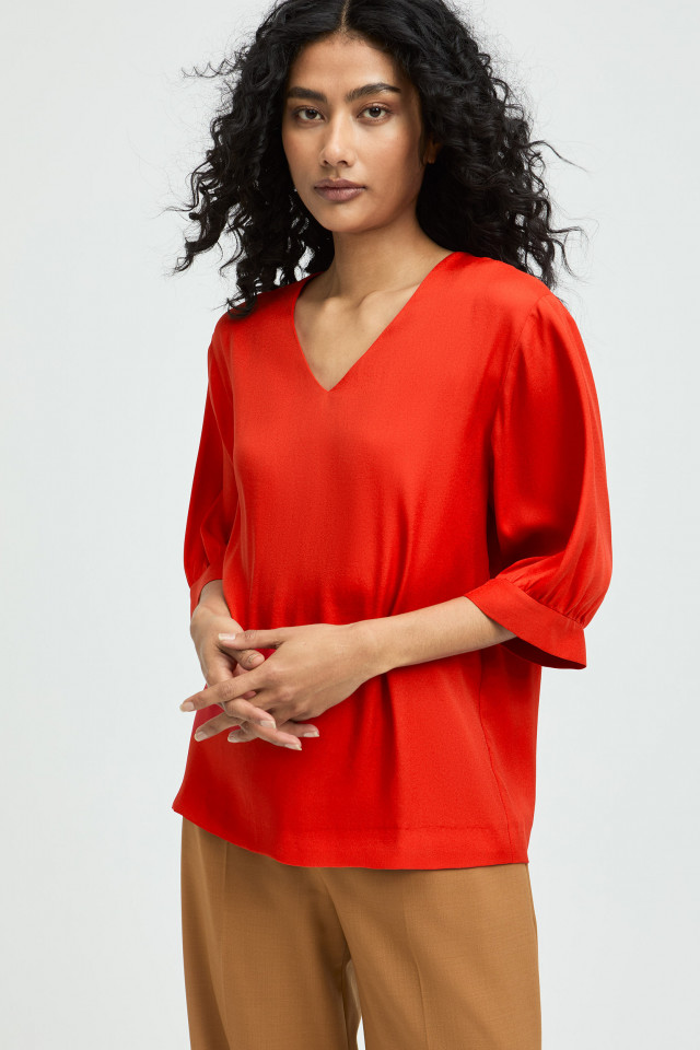 Blouse with V-neck and loose sleeves