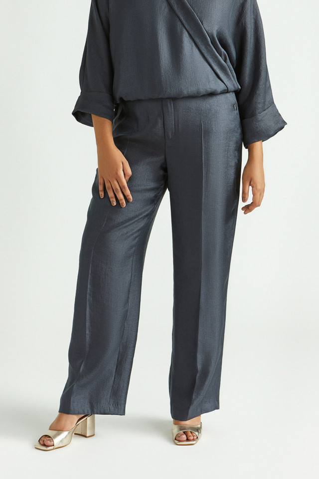 Shiny trousers with wide legs
