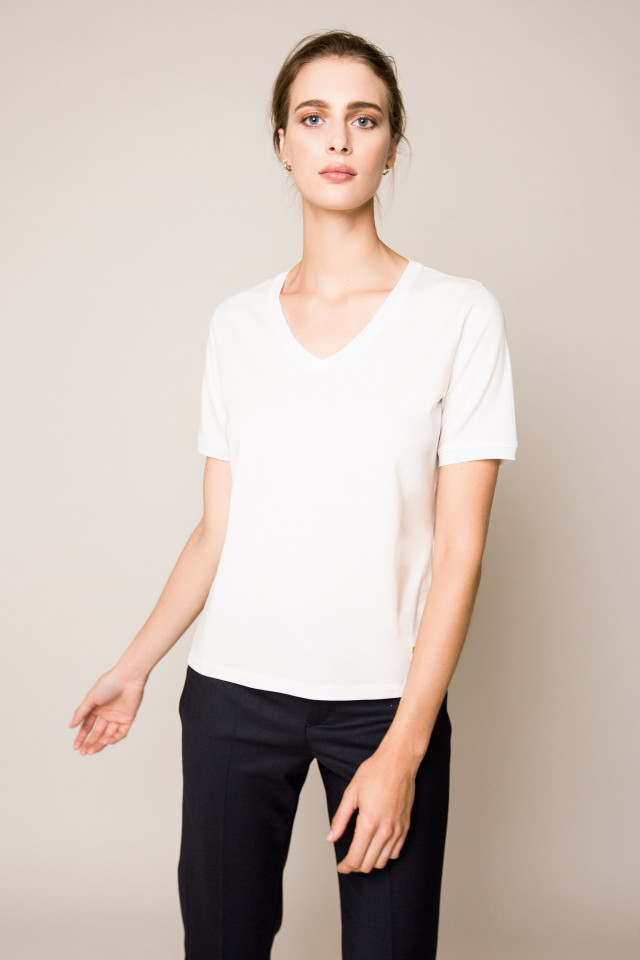 Off-white, short-sleeved T-shirt with a V-neck