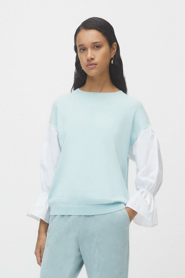 Mint green pullover with white blouse sleeves